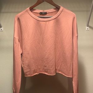 It is in the size large from the brand SHEIN.